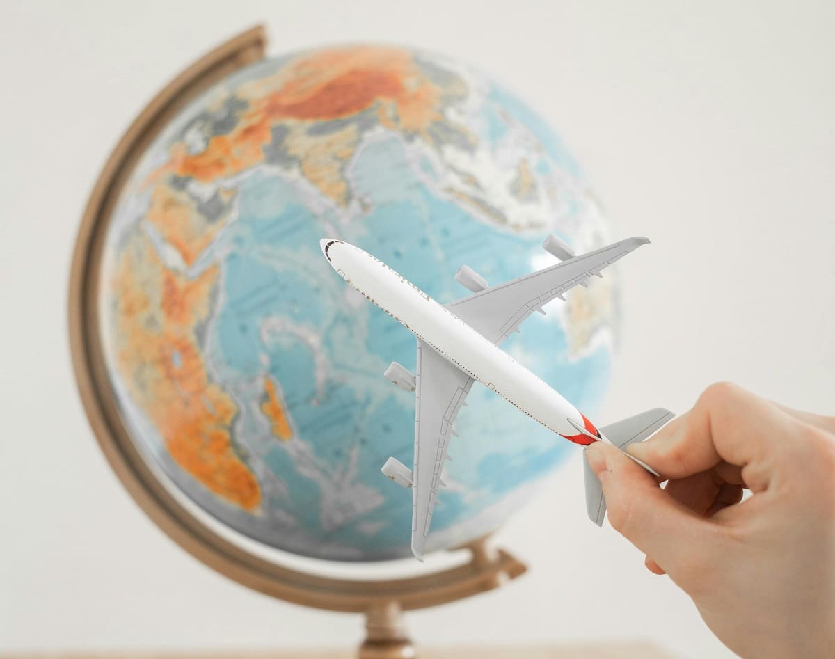 Close up shot of a person holding an airplane toy