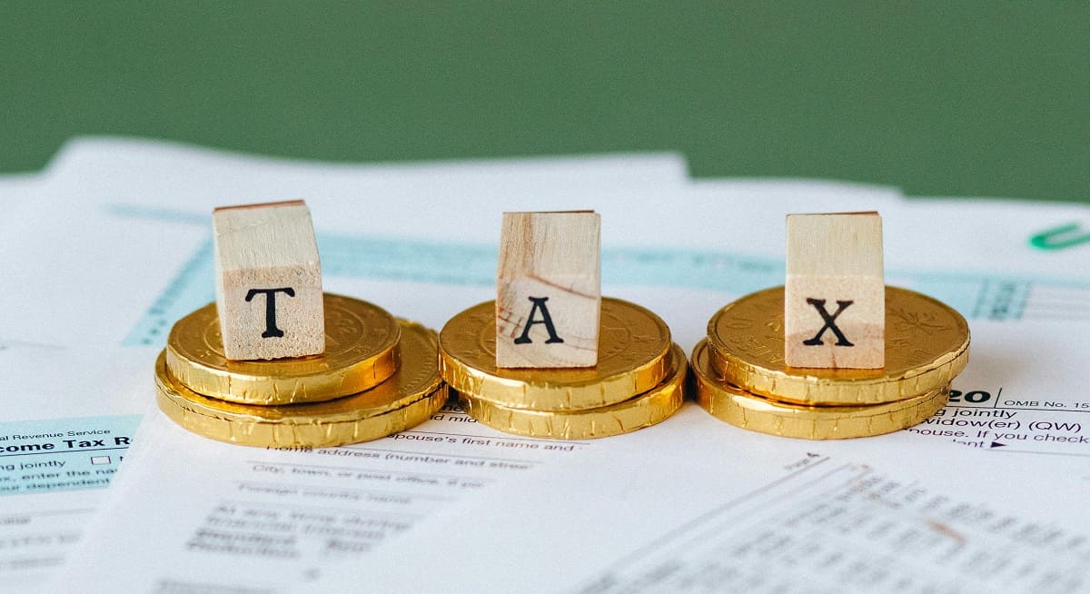 Gold coins on the top of documents